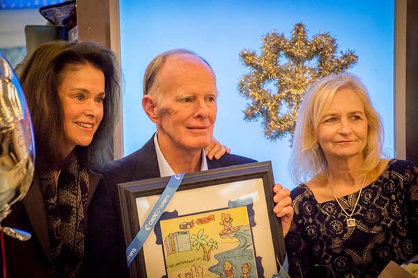 CHOC Children’s President and CEO Kimberly Chavalas Cripe, left, with Larry and Chris Laulhere.