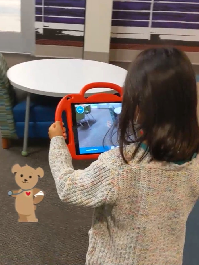 A child experiencing augmented reality at CHOC radiology