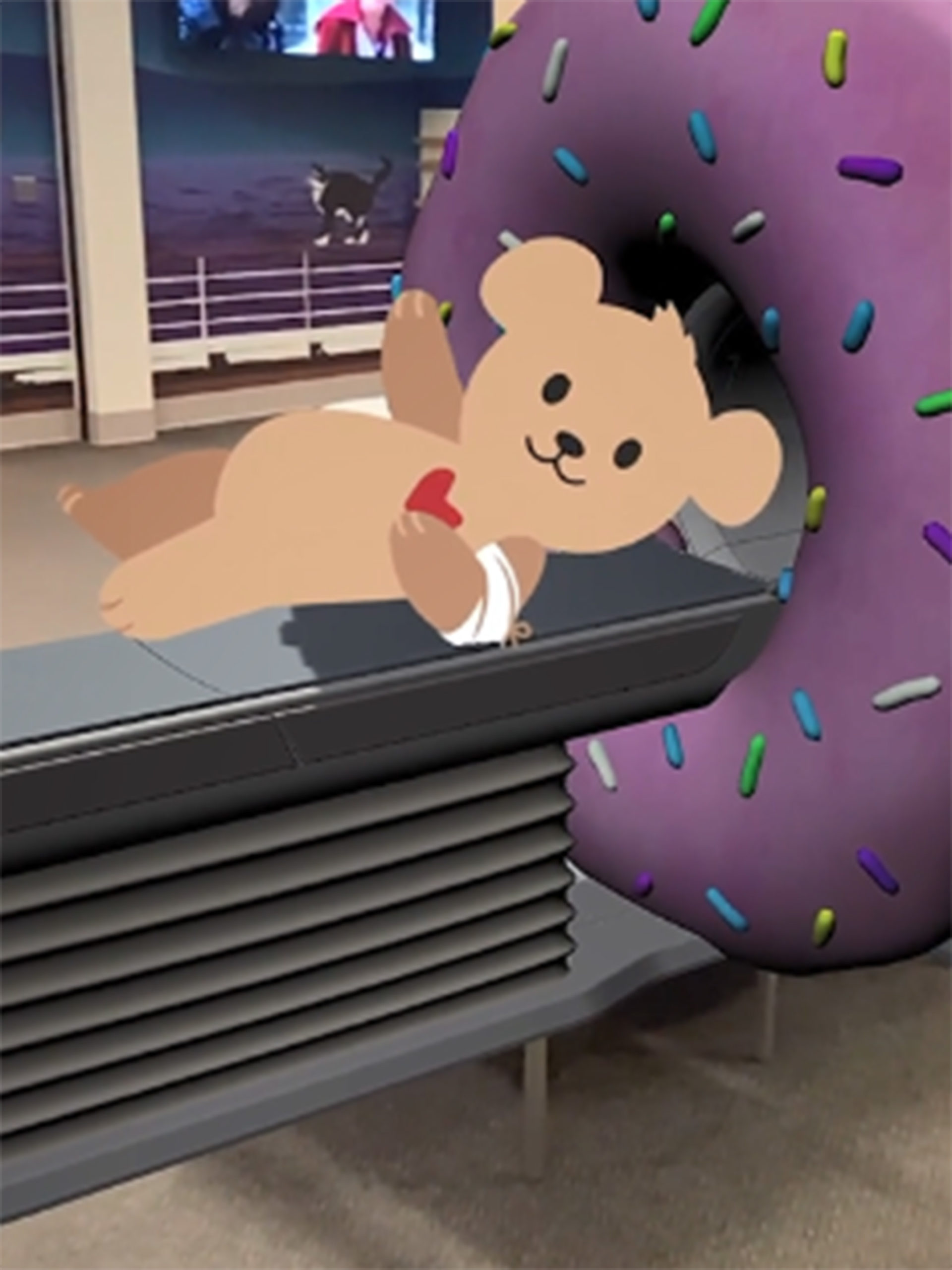 Choco receiving an MRI from a machine that looks like a donut