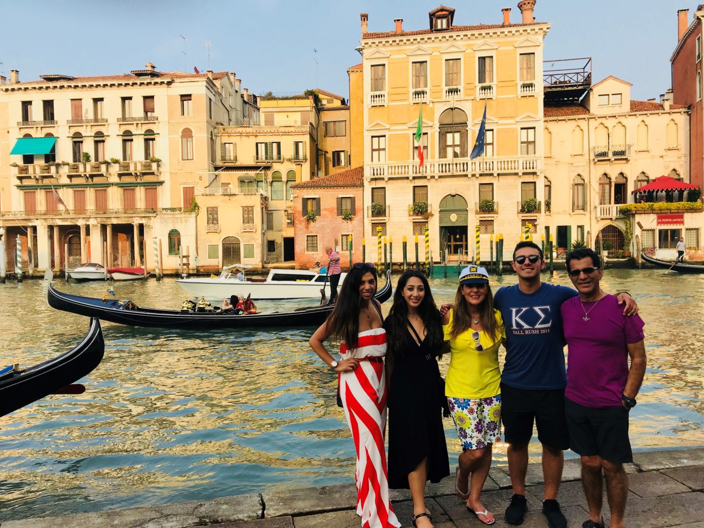 Tinoosh and her family stand in front of the canals in Venice, Italy