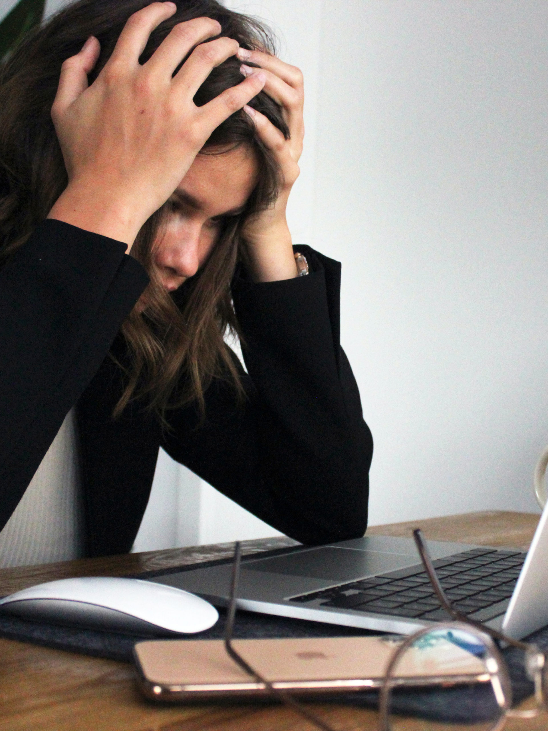 overscheduled teen at computer