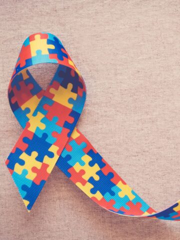 a ribbon with a colorful print of puzzle pieces