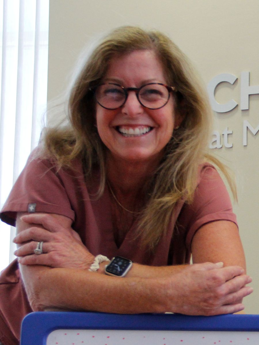 CHOC Mission longtime nurse Cathy Conlon looks at the camera and smiles