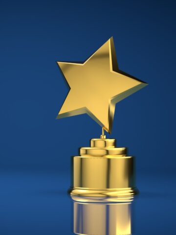 Graphic of trophy with gold star - CHOC lactation specialist earns SoCal Hospital Hero Award