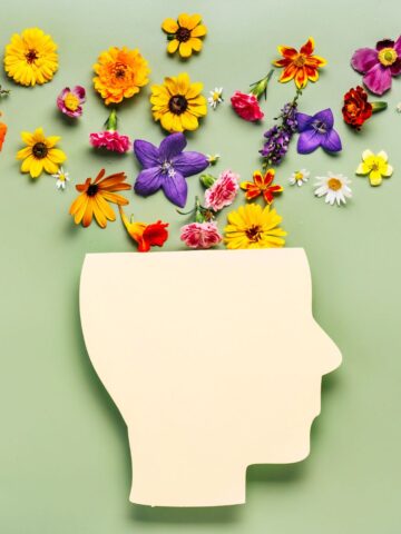 graphic image of flowers coming out of person's head - CHOC's mental health programs earn high ranking from Becker's Hospital Review