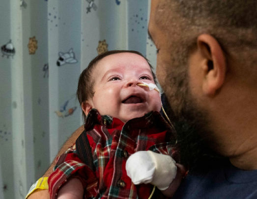 Patrick Tejada holds his son Patrick Alesandro Tejada in the NICU at CHOC.