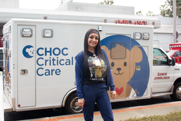 Tanya in front of CHOC Critical Care Emergency Vehicle